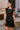 Addison Black Leather Cinched Mini Dress- frontal side view