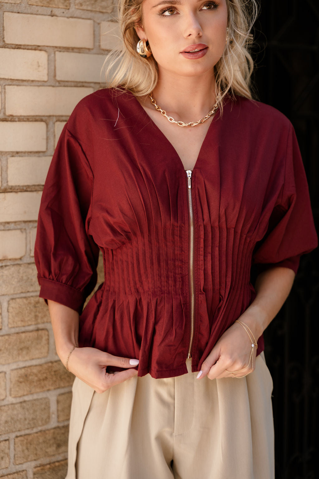 Elianna Burgundy Pleated Zip-Up Top- close up front view