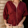 Elianna Burgundy Pleated Zip-Up Top- close up front view