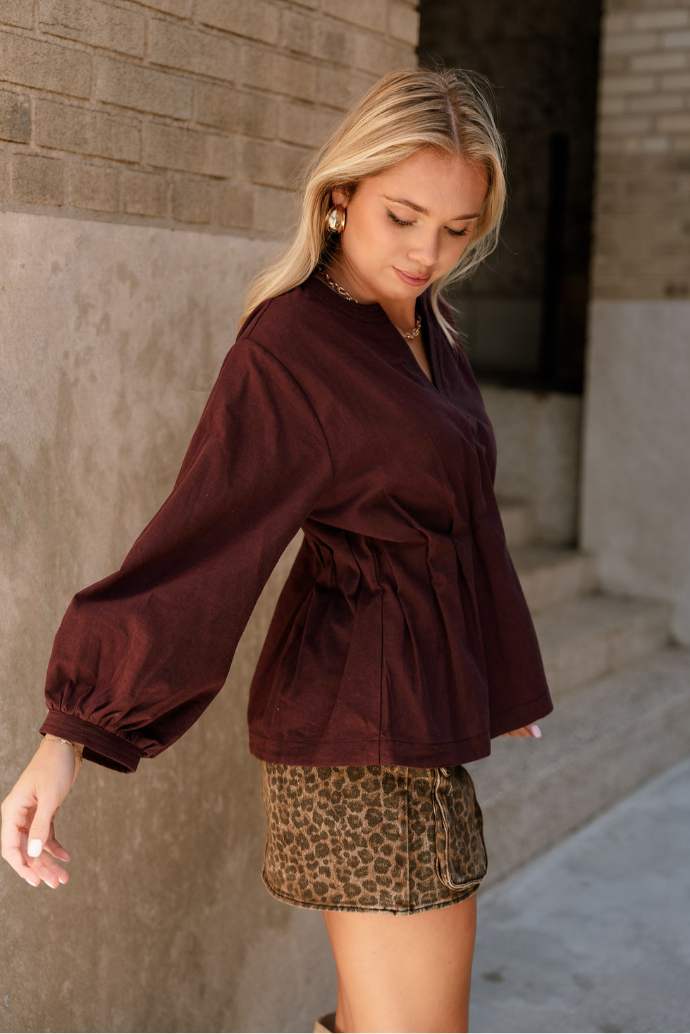 Leia Maroon Pleated Long Sleeve Top- frontal side view