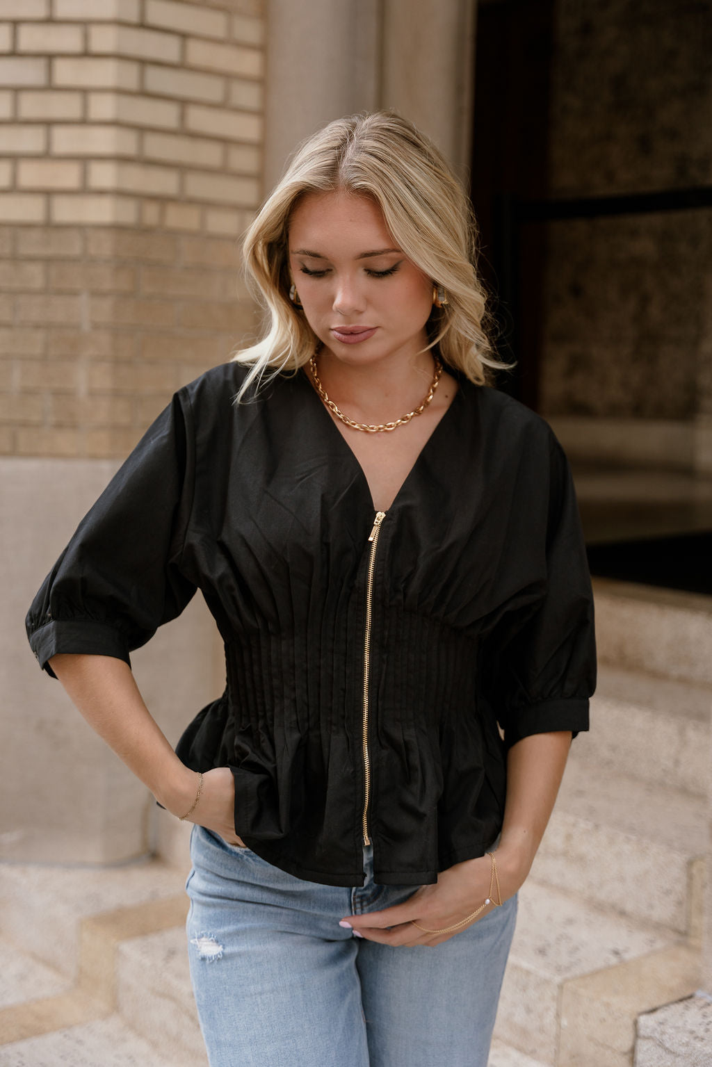Brittany Black Zip-Up Flare Top - front view