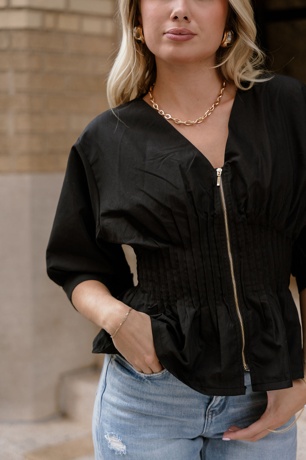 Brittany Black Zip-Up Flare Top - close front view