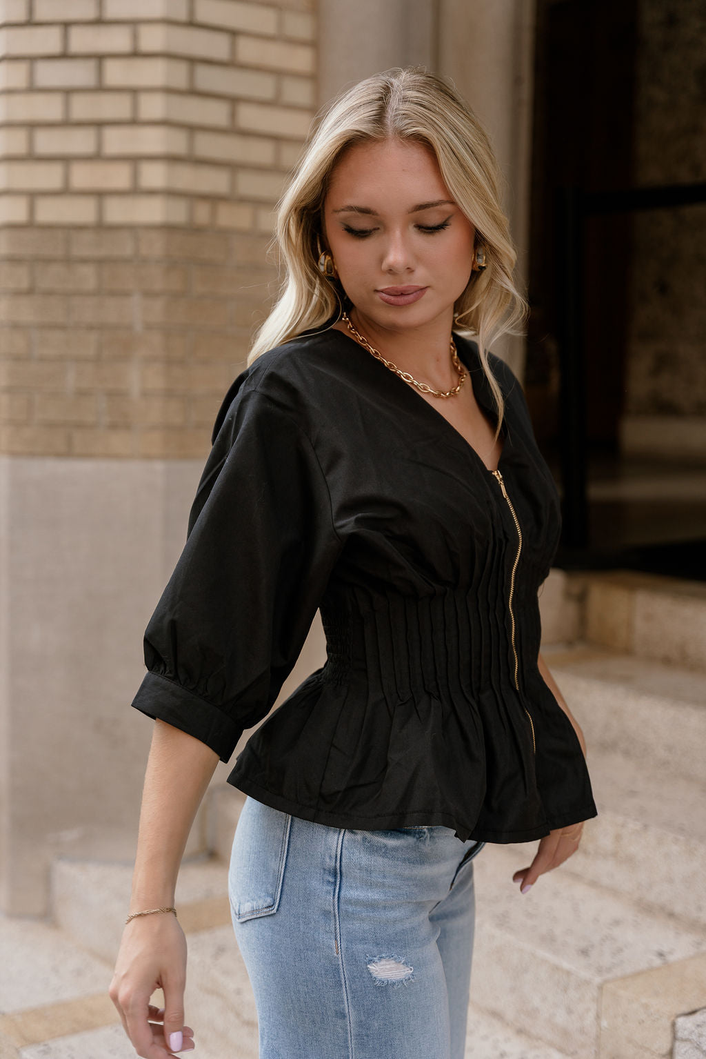 Brittany Black Zip-Up Flare Top - frontal view