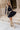Ada Beige & Silver Oval Buckle Boho Belt - full body front view on model