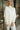 Teagan Cream Ribbed Poncho Sweater - Posed front view 