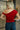 Auden Red Asymmetric Off-The-Shoulder Top - posed back view