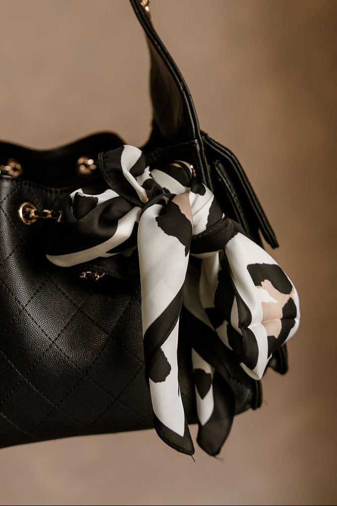 Harlow Leopard Print Satin Scarf - close up tied to purse