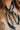 Chandler Navy Multi Tropical Print Satin Scarf - close up front view tied on model's neck