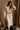 Solene Beige Knit Long Sleeve Midi Dress - front view with belt