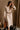 Solene Beige Knit Long Sleeve Midi Dress - front view with belt