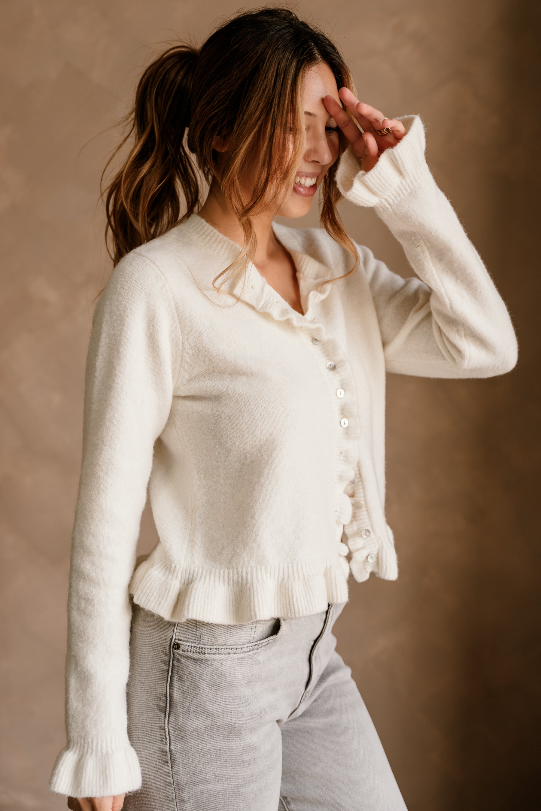 Noelle Off White Ruffle Knit Cardigan- frontal side view