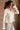 Noelle Off White Ruffle Knit Cardigan- frontal side view
