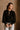 Andrea Black Zip-Up Top- close up top view
