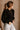 Andrea Black Zip-Up Top- frontal side view