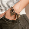 Roxy Cheetah Scarf Charm Bracelet - close up on model's wrist