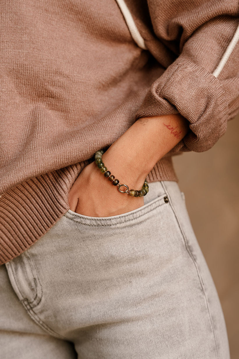 Aria Olive Beaded Bracelet - shown on model's wrist