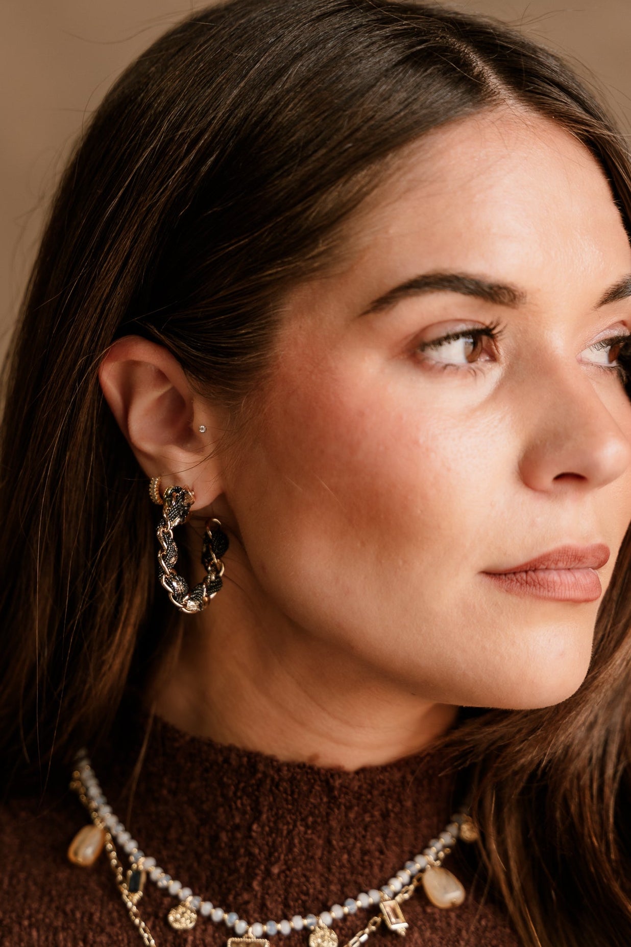 Anya Gold & Black Scarf Hoop Earrings - side view on model