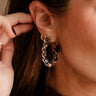 Anya Gold & Black Scarf Hoop Earrings - close up side view on model