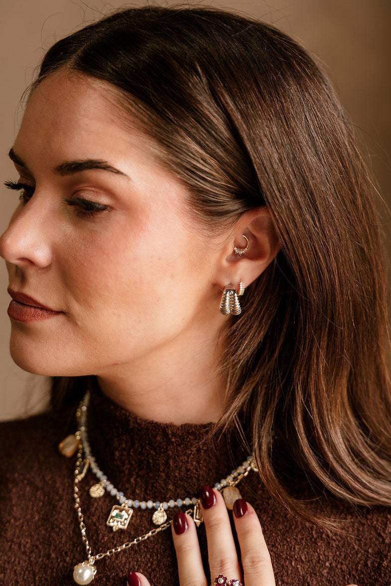 Shelly Silver & Gold Ribbed Hoop Earrings  - side view on model