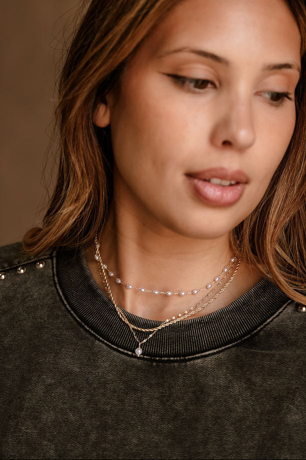 Belinda Layered Gold & Pearl Necklace - front view on model