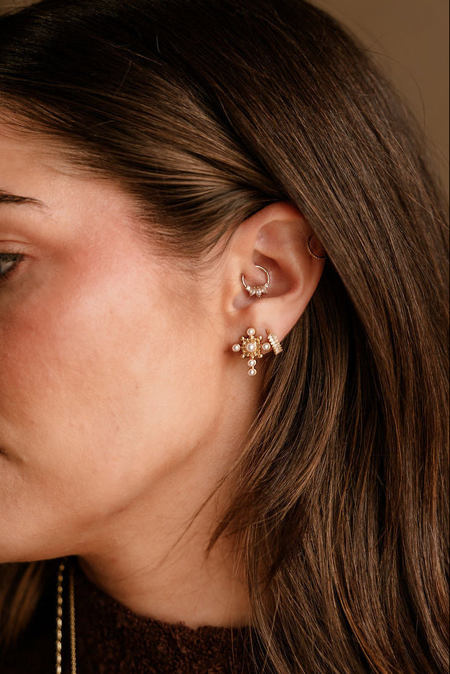 Simone Gold & Pearl Cross Stud Earrings - side view on model