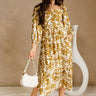 Dahlia Cream & Mustard Floral Maxi Dress- frontal side full body view