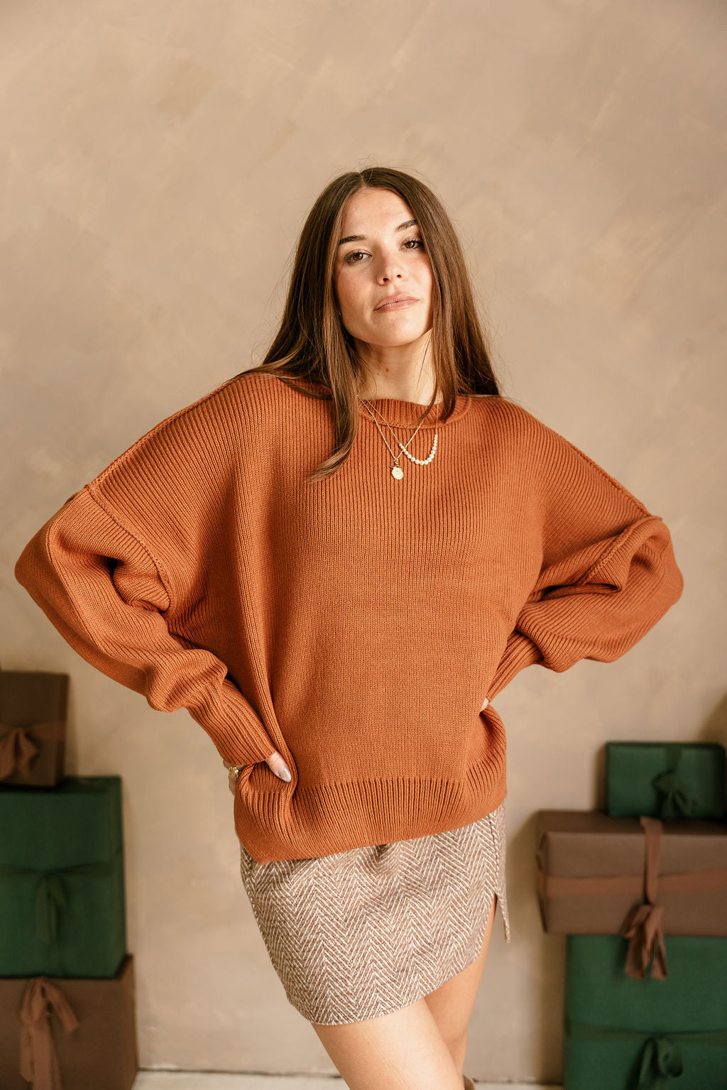 Aspen Brown Ribbed Knit Sweater- front view (hands on hips)