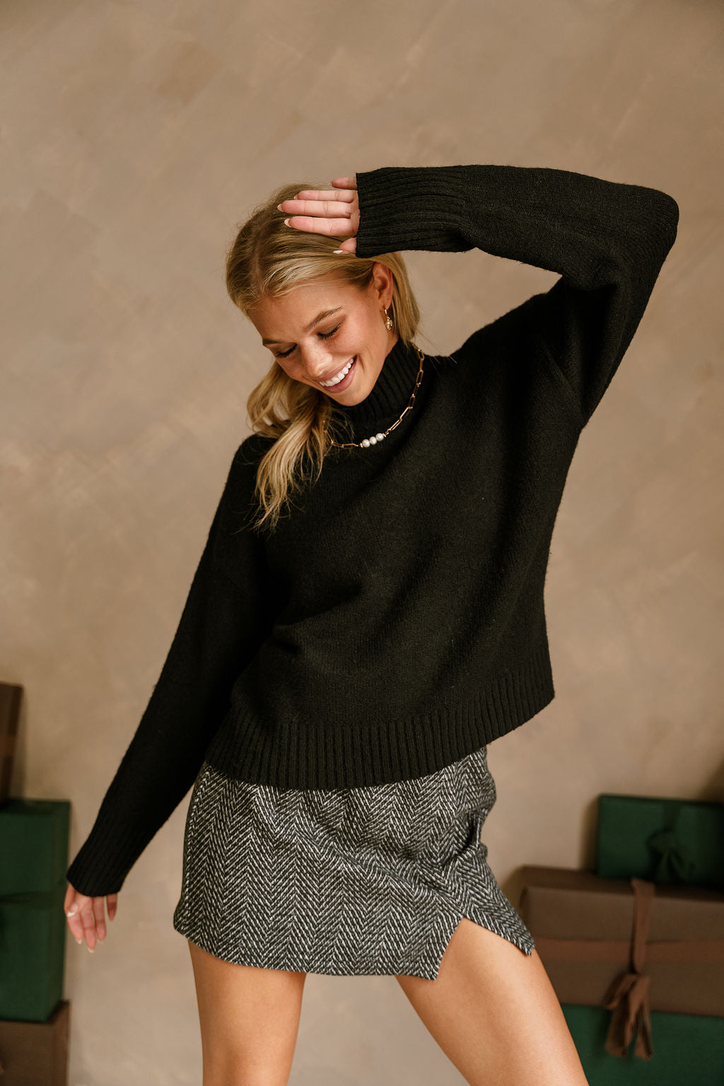 Emersyn Black Mock Neck Sweater - front view (arm raised)