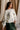 Grace Cream & Black Stitch Bows Sweater- frontal side view