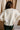 Grace Cream & Black Stitch Bows Sweater- close up back view