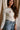 Noelle Cream Christmas Ribbed Top- close up frontal side view
