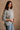 Norah Heather Grey Turtleneck Sweater- frontal side view