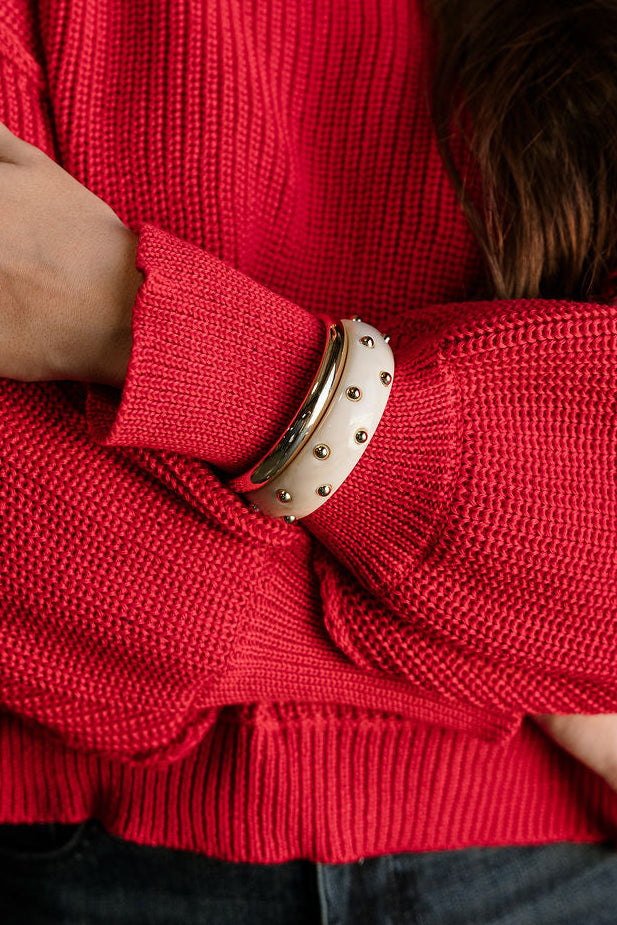 Alexis Cream & Gold Bangle Set - close up on model's wrist