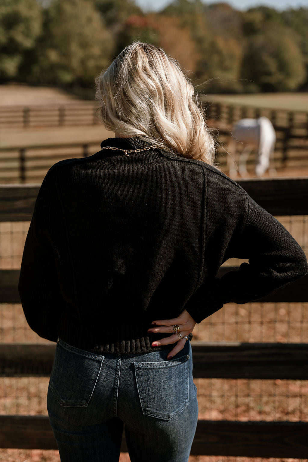Selah Black Cable Knit Sweater- top close up back view