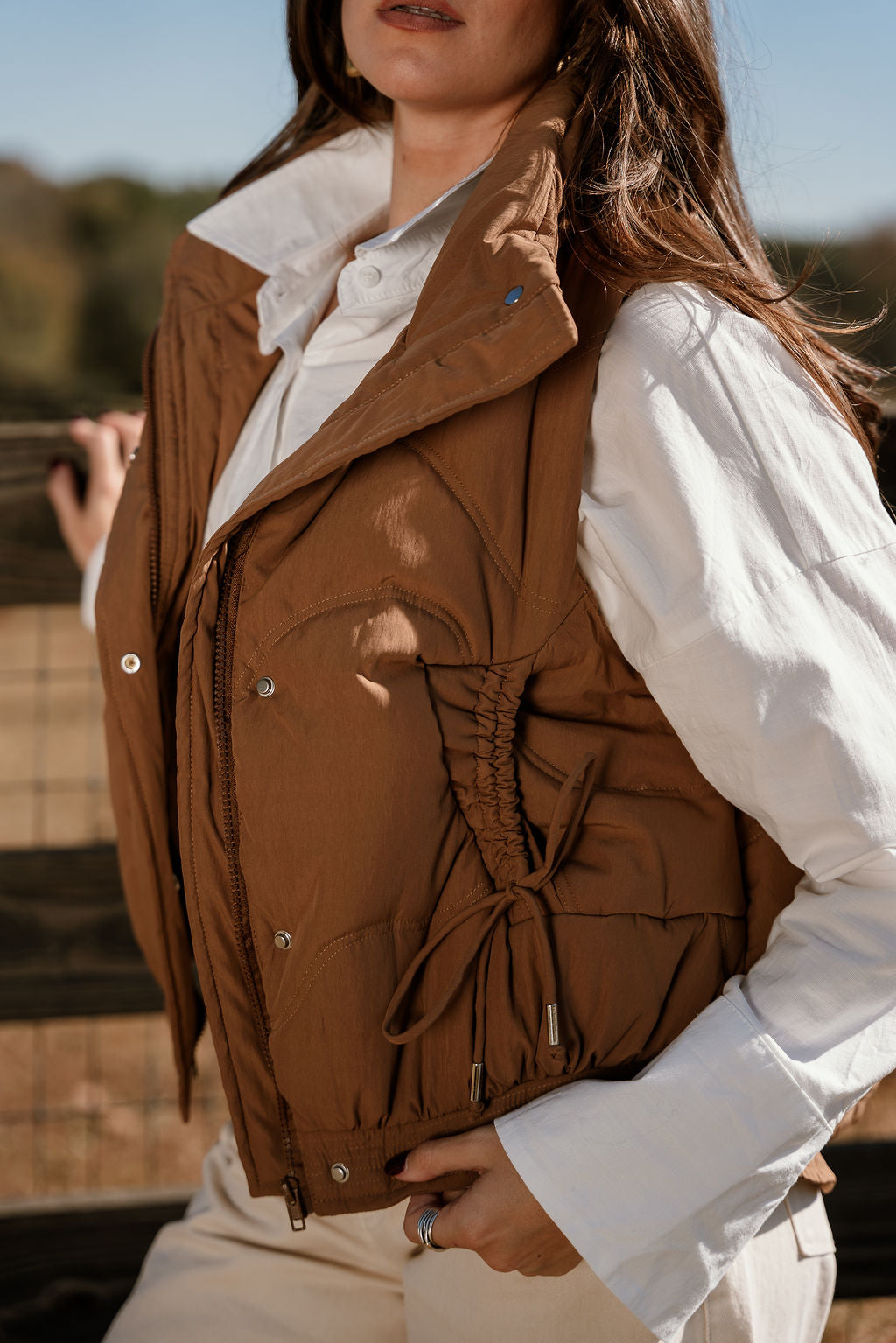 Vera Brown Puffer Zip-Up Vest- close up top side view