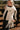 Marlowe Ivory Fringe Scarf - close front view wrapped on blonde model 