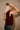 Camille Burgundy Turtleneck Sleeveless Sweater- close up side view
