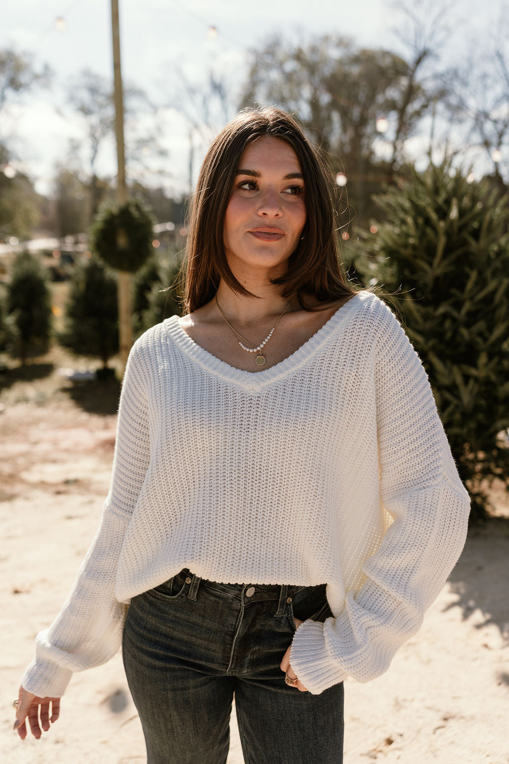 Lina White V-Neckline Sweater - front view tucked in