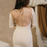 Aria Beige Scoop Back Mini Dress- close up back view