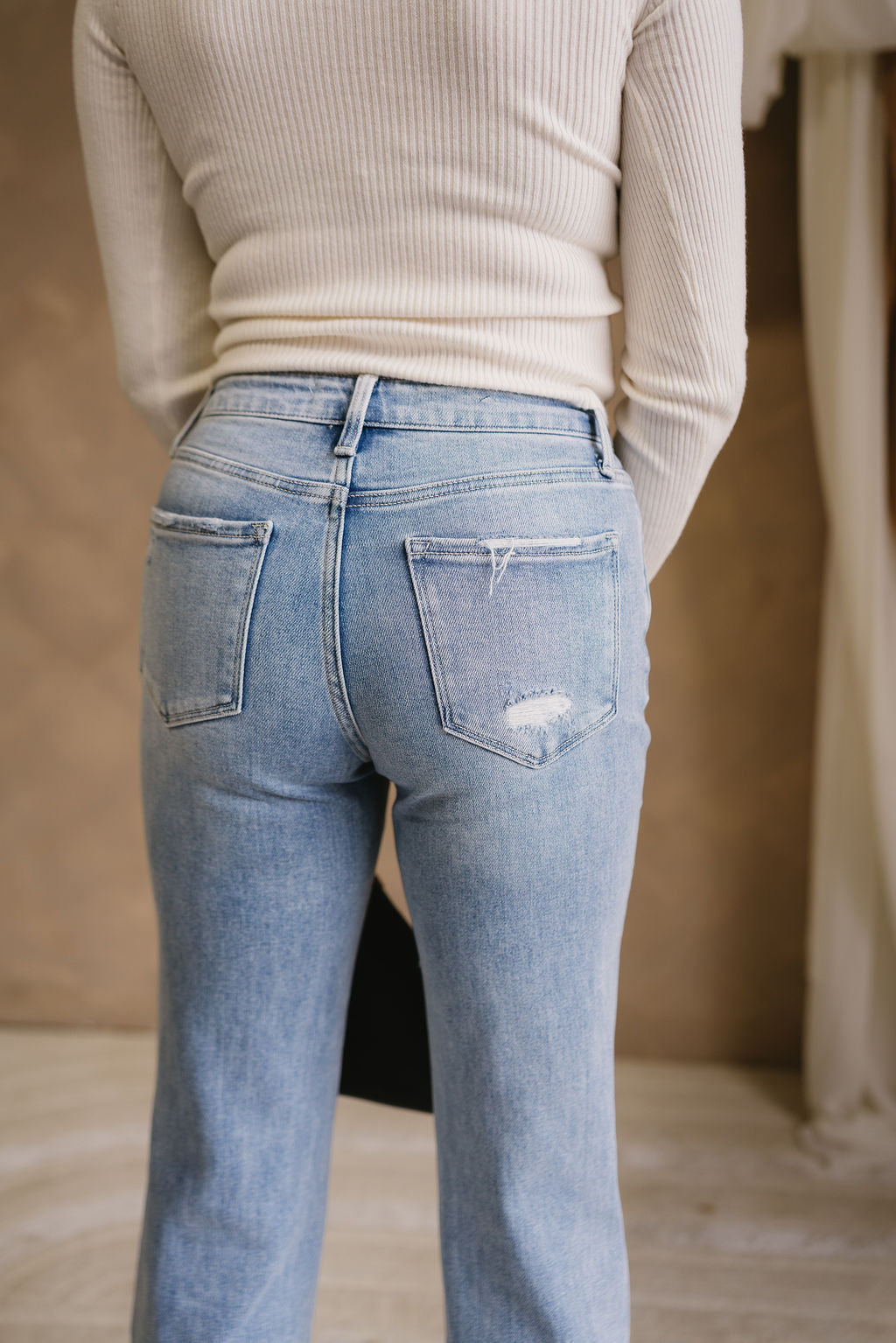 Alina Light Wash Denim Distressed Jeans- close up back view