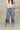 Kancan: Blake Medium Wash Cropped Cuff Hem Jeans- close up top view