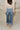 Kancan: Blake Medium Wash Cropped Cuff Hem Jeans- close up full body back view