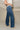 Mica: Mya Medium Wash High Rise Jeans- frontal side view