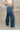 Mica: Mya Medium Wash High Rise Jeans- frontal side view