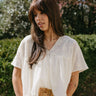 Bonnie Cream Embroidered Floral Top - front view (tucked with belt)