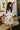 Nia Cream & Black Polka Dot Off-The-Shoulder Dress- front close up side view