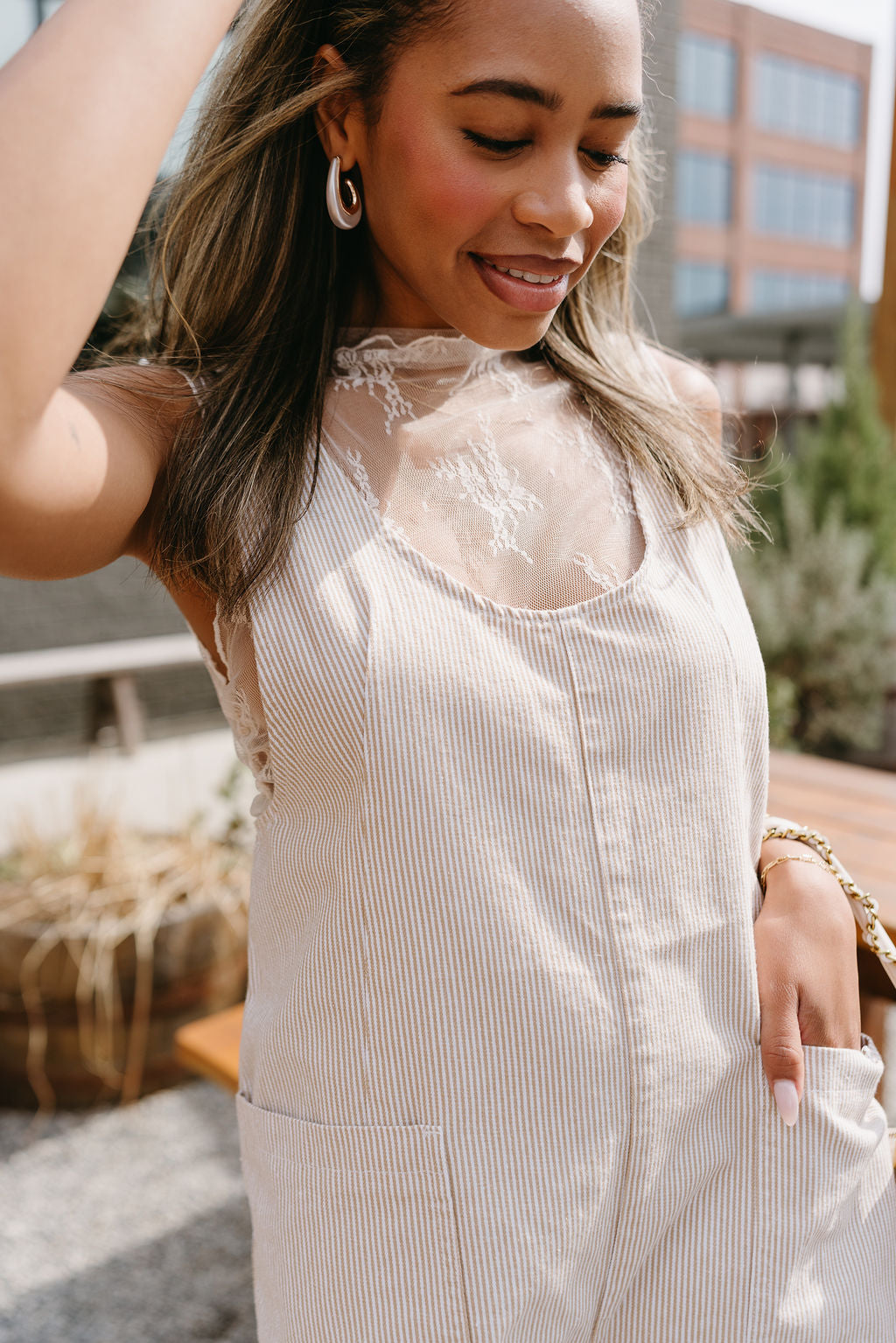 Raya Taupe & White Stripe Romper- close up top view