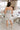 Blakeley Blue & Cream Floral Romper- full body back view