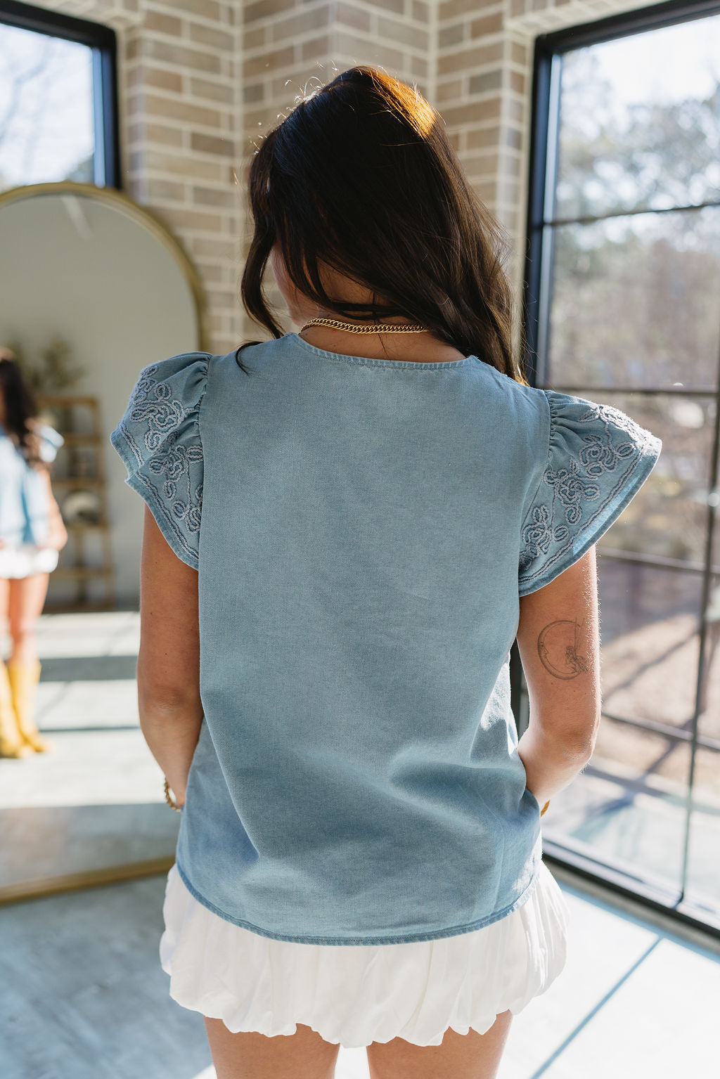 Destiny Denim Ruffle Short Sleeve Top- close up back view