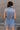 Viola Washed Denim Tie Waist Romper- close up back view